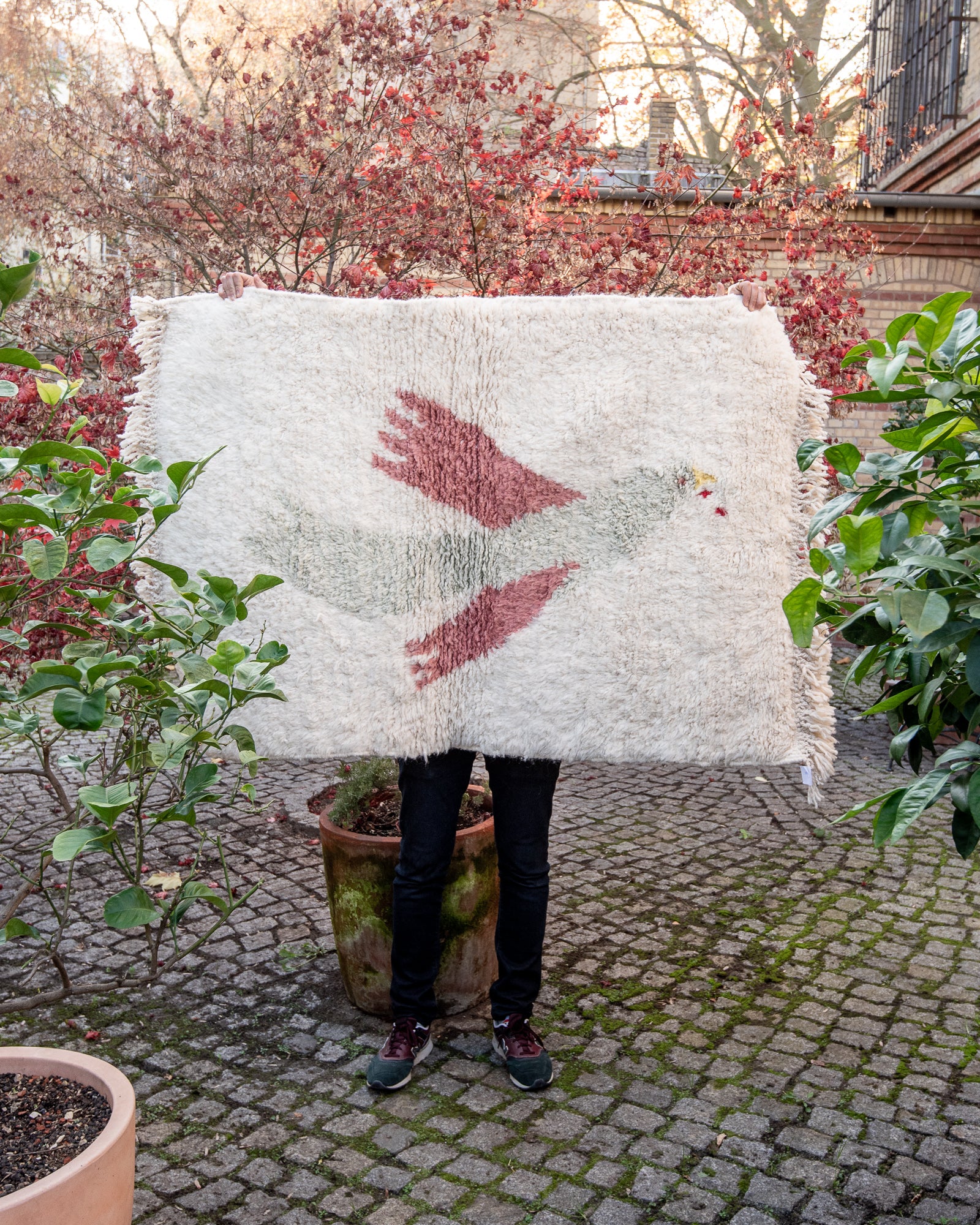Modern, designer, handcrafted Berber rug from Morocco. Beniourain carpet with beautiful colours and patterns and fluffy wool texture.